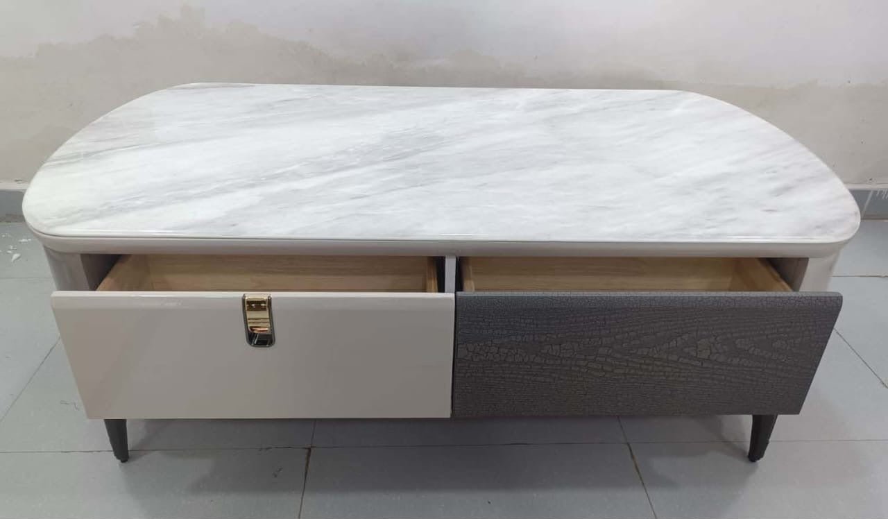 “Elysian Marble Center Table with Refined Modern Design”